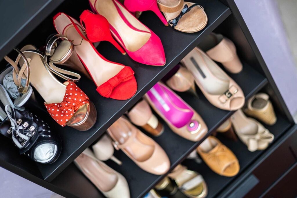 closet shelves full of shoes
